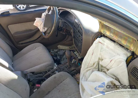 1996 Toyota Camry Dx/Le/Xle z USA, uszkodzony, nr VIN 4T1BG12K7TU657444